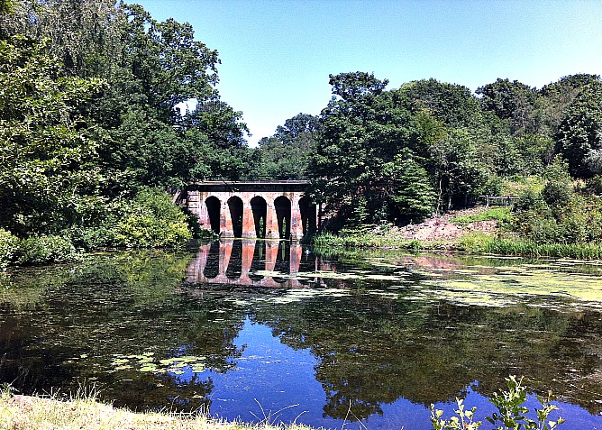 Hampstead Heath’s historic Red Arches bridge and secluded pond is a perfect spot for a romantic retreat close to Hampstead properties