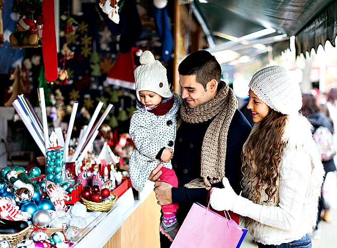 Browsing happily at a stall in Hampstead’s annual Christmas market, a short distance from elegant Hampstead property